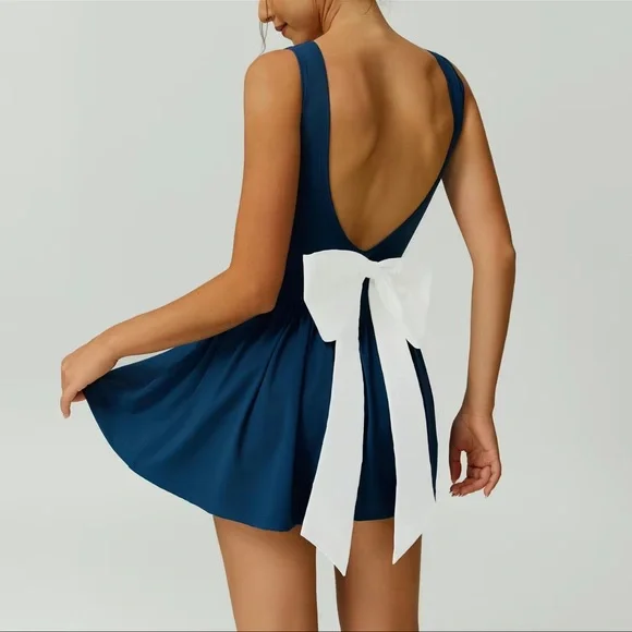 navy blue athletic dress with a large white removable bow size L - Picture 1 of 13